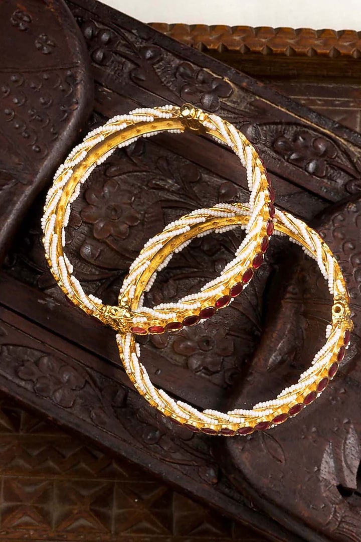 Gold Plated Uncut Polki & Beaded Jadau Bangles (Set Of 2) by Mortantra at Pernia's Pop Up Shop