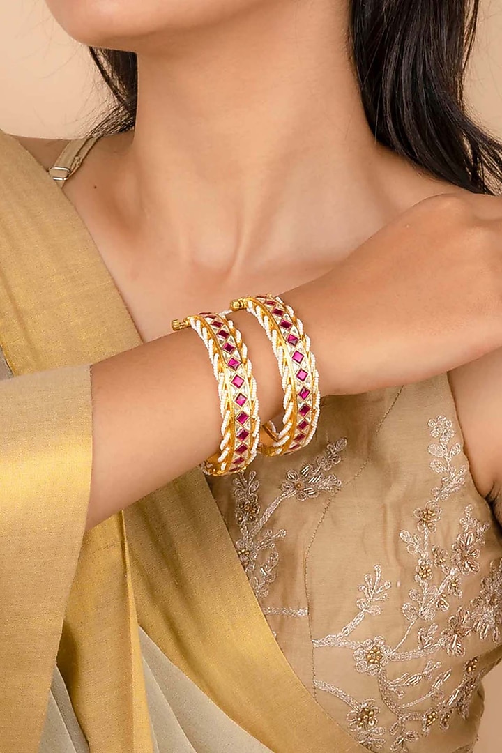 Gold Plated Uncut Polki & Beaded Jadau Bangles (Set Of 2) by Mortantra at Pernia's Pop Up Shop