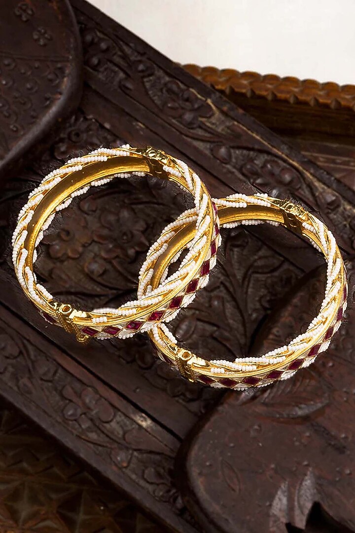 Gold Plated Uncut Polki & Beaded Jadau Bangles (Set Of 2) by Mortantra at Pernia's Pop Up Shop