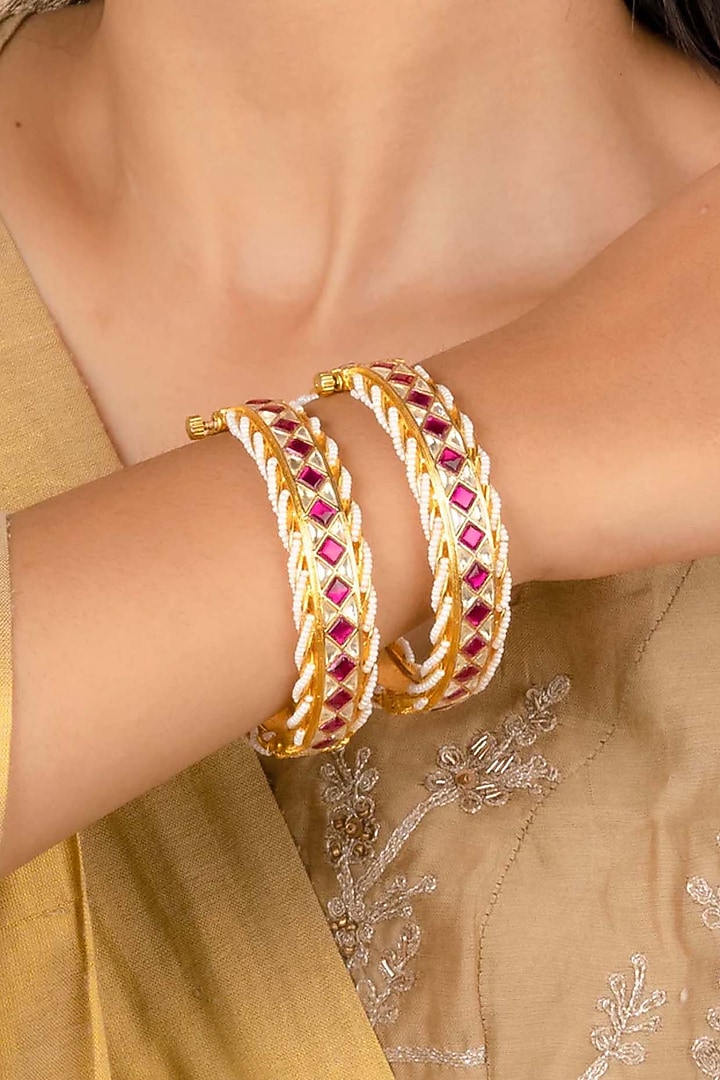 Gold Plated Uncut Polki & Beaded Jadau Bangles (Set Of 2) by Mortantra at Pernia's Pop Up Shop