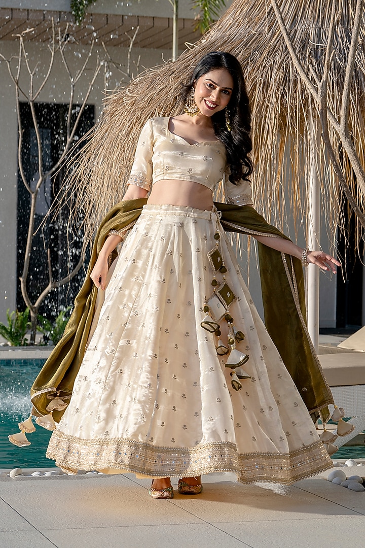 Ivory Green Tissue Embroidered Lehenga Set by House Of Jamoti at Pernia's Pop Up Shop