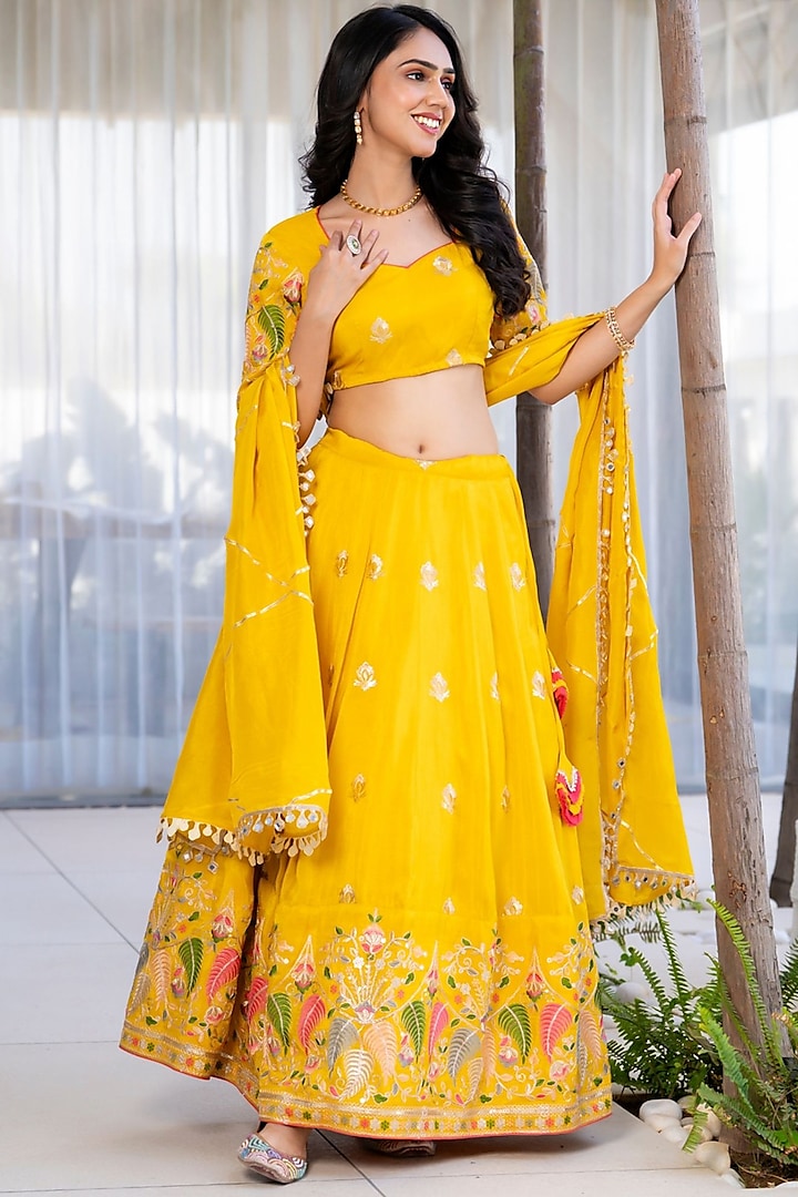 Yellow Tissue Zari & Floral Embroidered Lehenga Set by House Of Jamoti at Pernia's Pop Up Shop