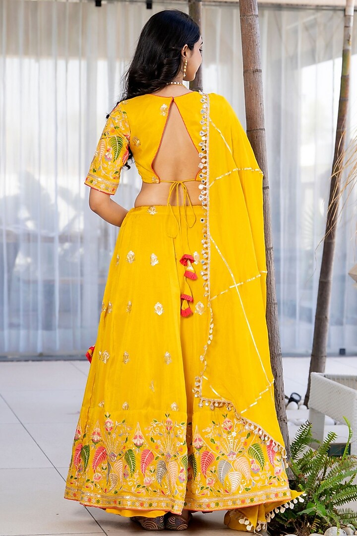 Yellow Tissue Zari & Floral Embroidered Lehenga Set by House Of Jamoti at Pernia's Pop Up Shop