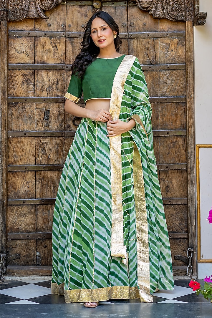 Green Viscose Georgette Leheriya Printed Lehenga Set by House Of Jamoti at Pernia's Pop Up Shop