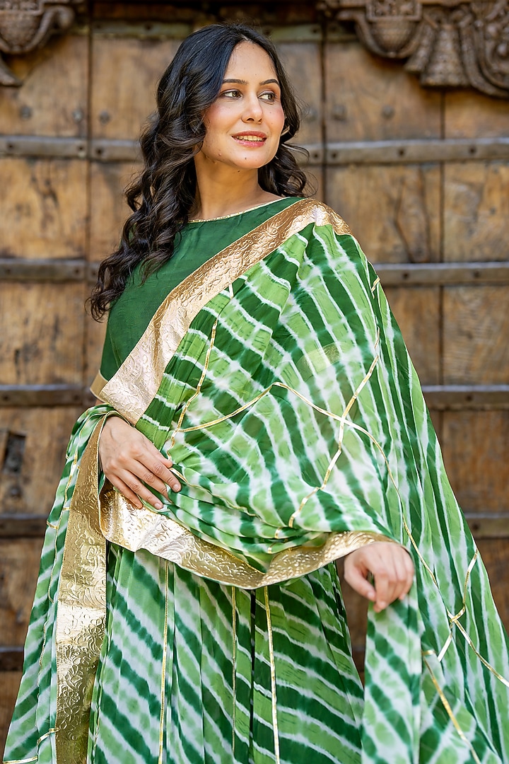 Green Viscose Georgette Leheriya Printed Lehenga Set by House Of Jamoti at Pernia's Pop Up Shop