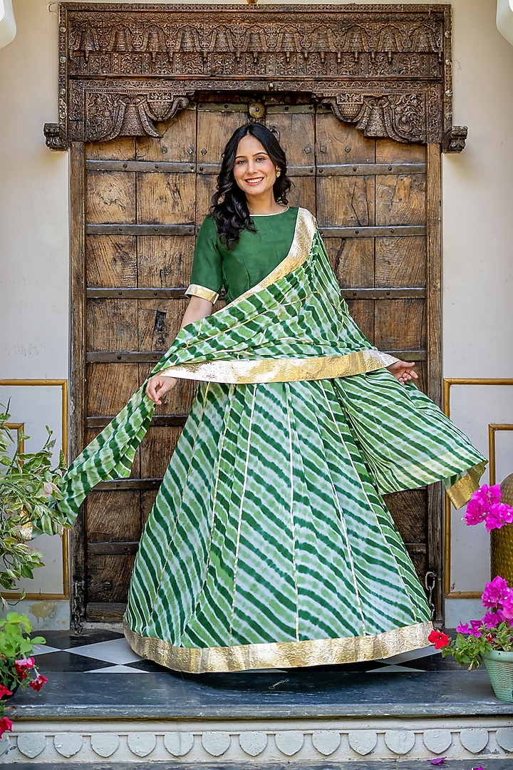 Green Viscose Georgette Leheriya Printed Lehenga Set by House Of Jamoti at Pernia's Pop Up Shop