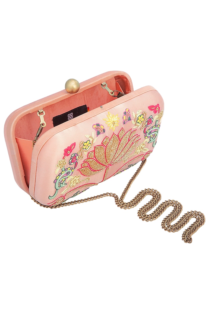 Peach embroidered clutch available only at Pernia's Pop Up Shop.