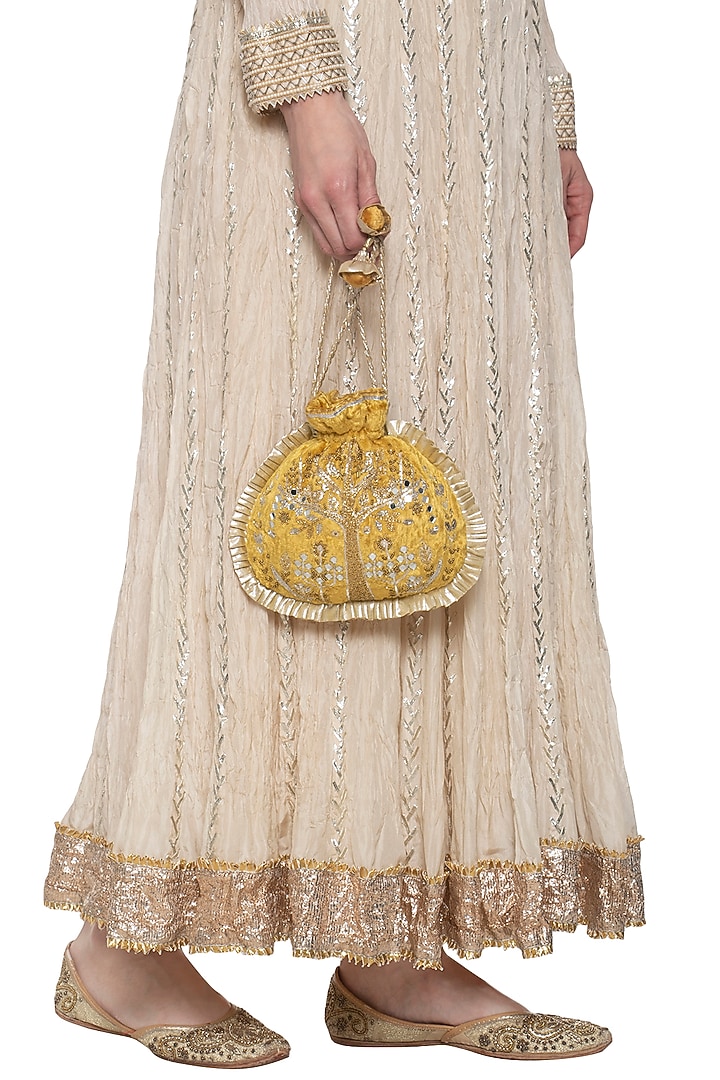 Ochre gold embroidered potli available only at Pernia's Pop Up Shop.