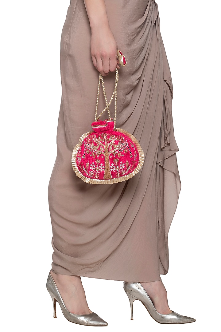 Fuschia embroidered potli available only at Pernia's Pop Up Shop.