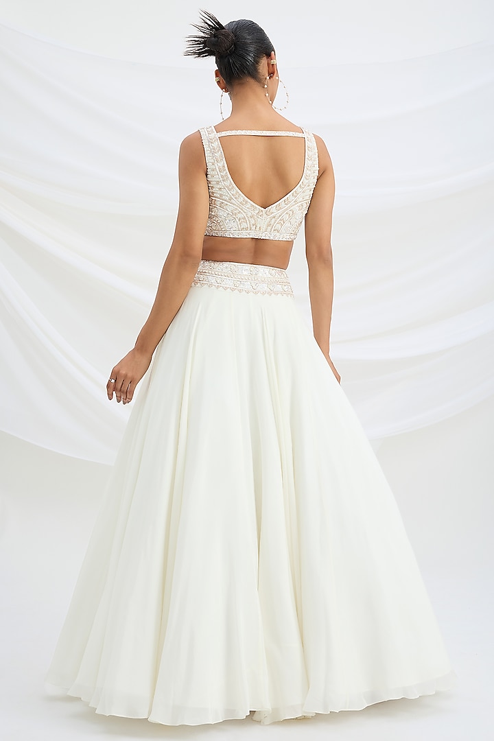 Ivory Viscose Crepe Embroidered Wedding Lehenga Set by Mirroir at Pernia's Pop Up Shop