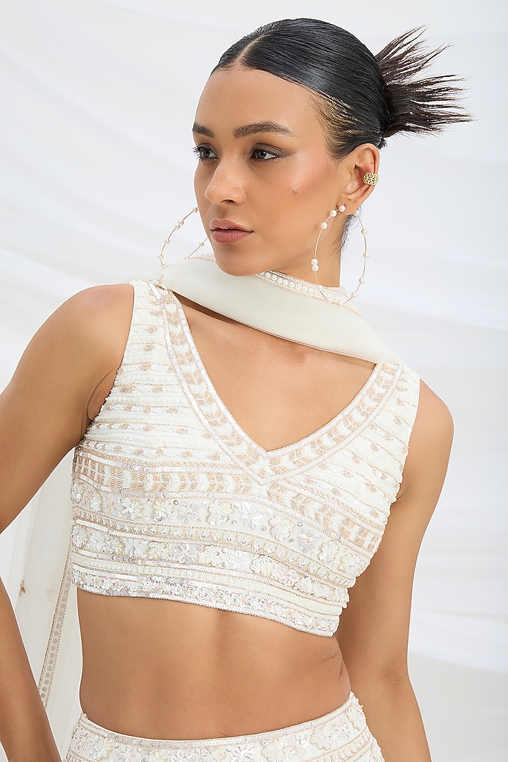 Ivory Viscose Crepe Embroidered Wedding Lehenga Set by Mirroir at Pernia's Pop Up Shop