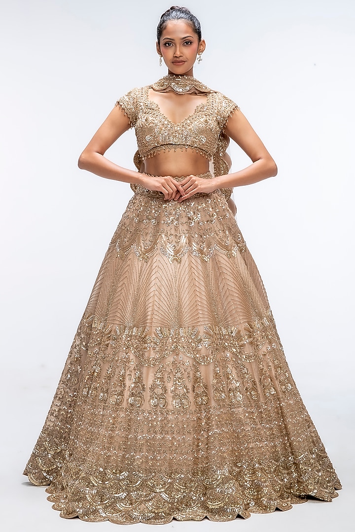 Gold Mirage Pure Silk Sequins Embellished Scalloped Bridal Lehenga Set by Mirroir at Pernia's Pop Up Shop