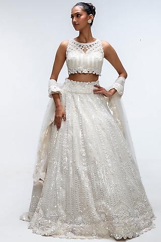Ivory Illume Pure Silk Sequins Embellished Lehenga Set by Mirroir