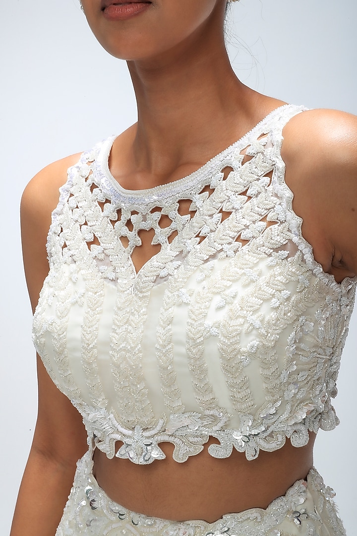 Ivory Illume Pure Silk Sequins Embellished Bridal Lehenga Set by Mirroir at Pernia's Pop Up Shop