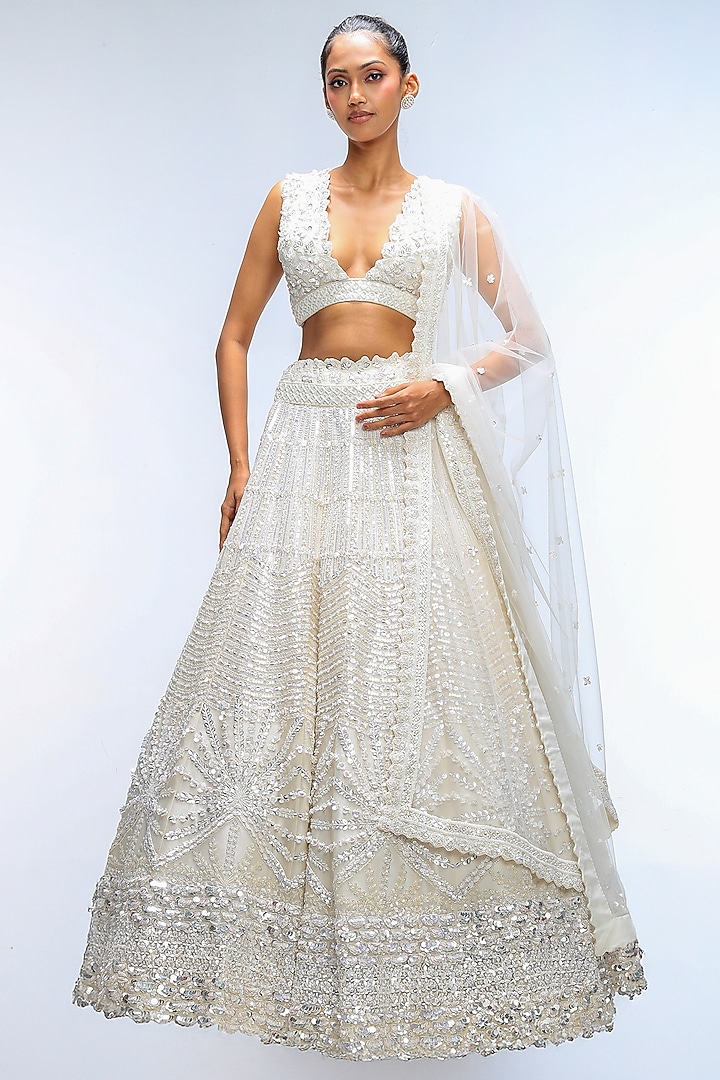 Ivory Illume Pure Silk Sequins Embellished Bridal Lehenga Set by Mirroir at Pernia's Pop Up Shop