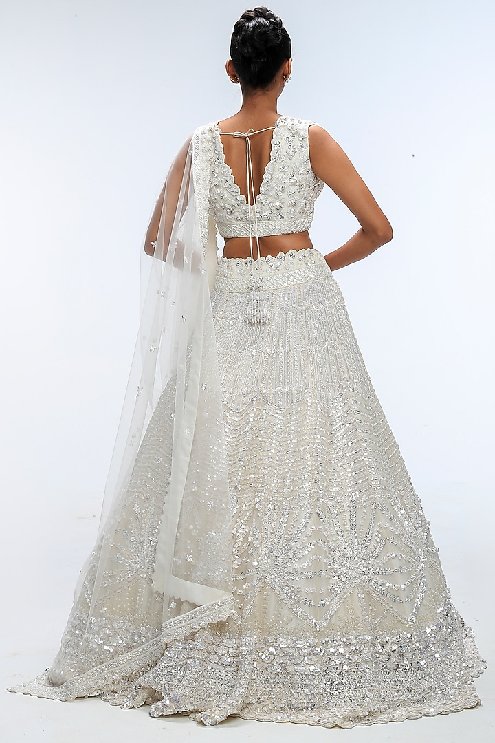Ivory Illume Pure Silk Sequins Embellished Bridal Lehenga Set by Mirroir at Pernia's Pop Up Shop