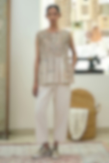 Antique White Kala Cotton Twill Weave Cross-Pleat Trousers by Meld Studio at Pernia's Pop Up Shop