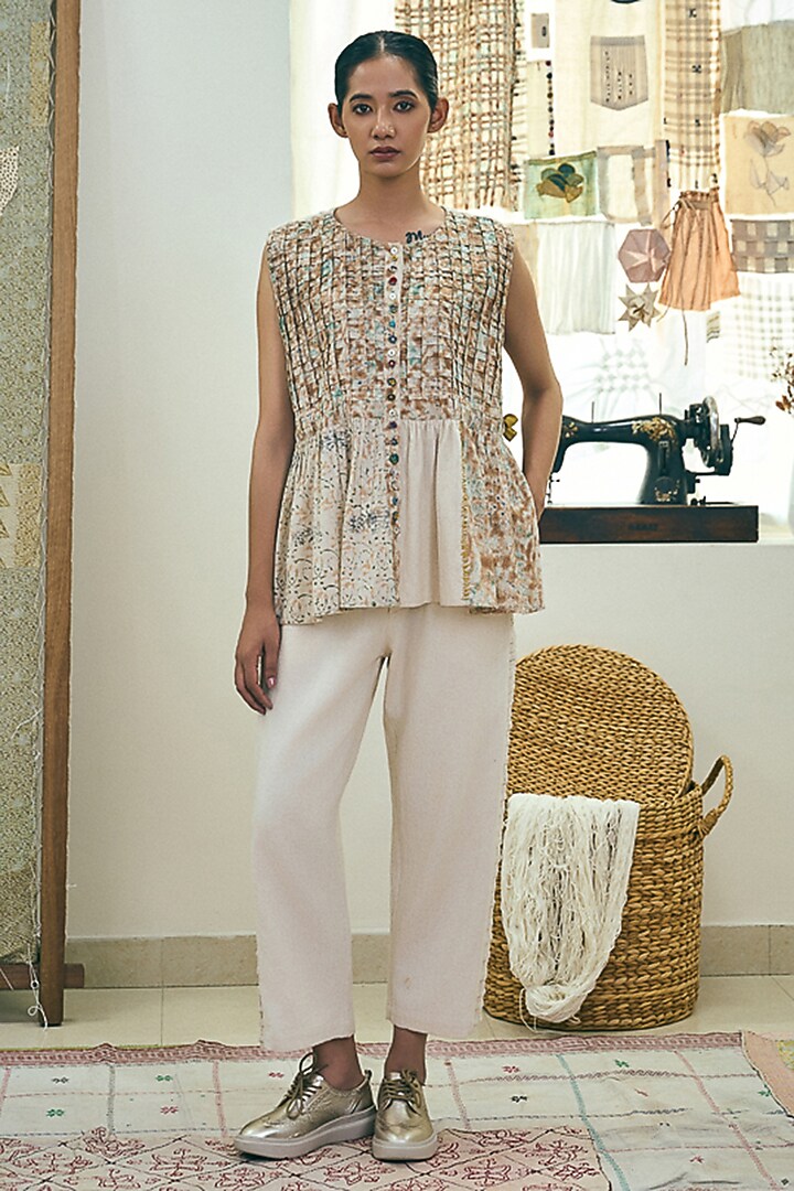 Antique White Kala Cotton Twill Weave Cross-Pleat Trousers by Meld Studio at Pernia's Pop Up Shop
