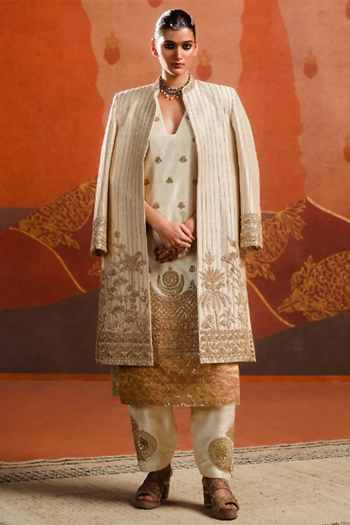 Ivory Heavy Raw Silk Gold Embroidered Kurta Set by Masaba at Pernia's Pop Up Shop