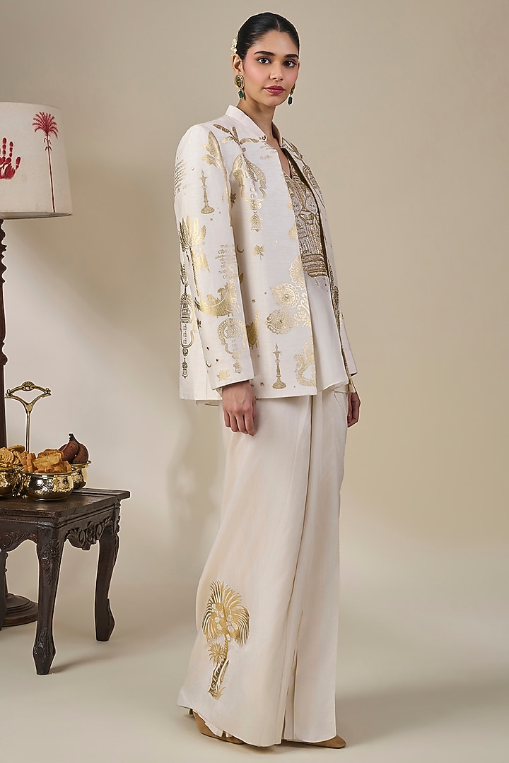 Ivory Viscose Slub Embellished Pleated Skirt Set by Masaba at Pernia's Pop Up Shop