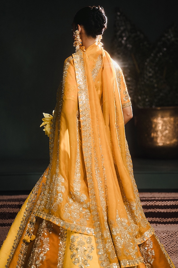 Ochre Yellow Heavy Raw Silk Floral Motif Work Bridal Lehenga Set by Masaba at Pernia's Pop Up Shop