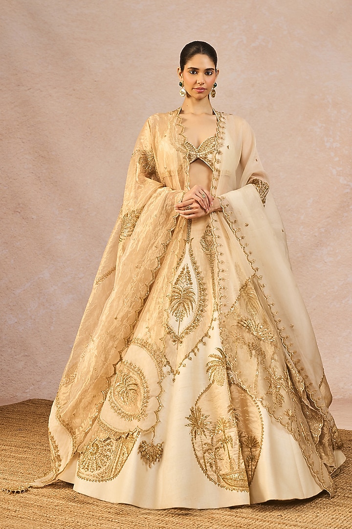 Ivory & Gold Tissue Chaand Kashti Motif Embroidered Bridal Lehenga Set by Masaba at Pernia's Pop Up Shop