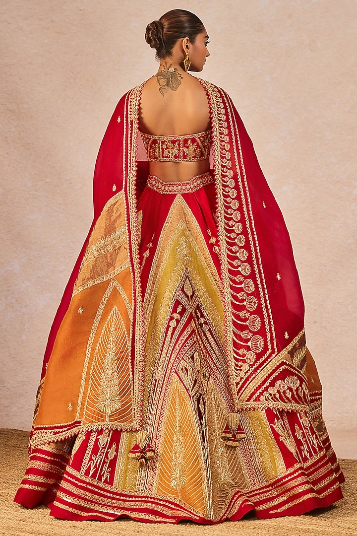 Red Raw Silk Mithi Makaai Motif Embroidered Bridal Lehenga Set by Masaba at Pernia's Pop Up Shop