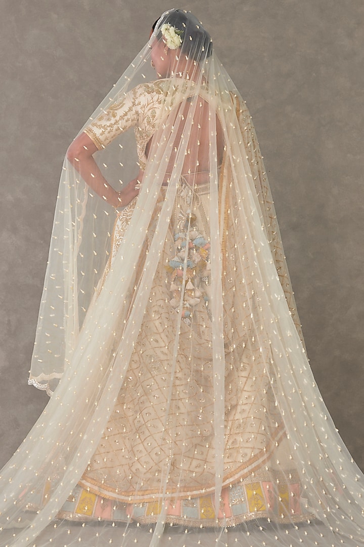 Ivory Raw Silk Resham & Sitara Embroidered Bridal Lehenga Set by Masaba at Pernia's Pop Up Shop