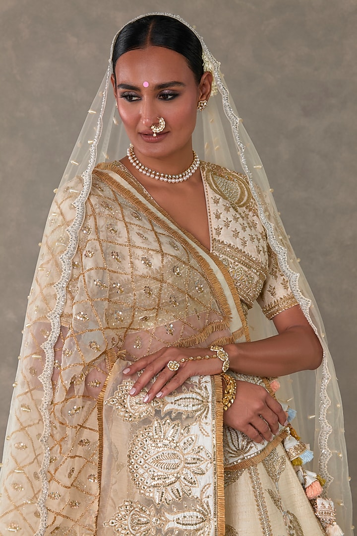 Ivory Raw Silk Resham & Sitara Embroidered Bridal Lehenga Set by Masaba at Pernia's Pop Up Shop