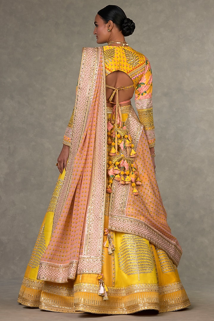 Yellow Raw Silk Motif & Sitara Embellished Bridal Lehenga Set by Masaba at Pernia's Pop Up Shop