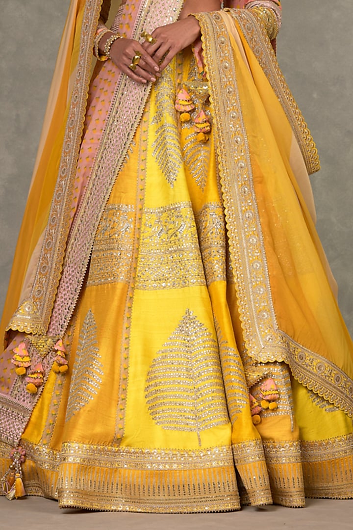 Yellow Raw Silk Motif & Sitara Embellished Bridal Lehenga Set by Masaba at Pernia's Pop Up Shop