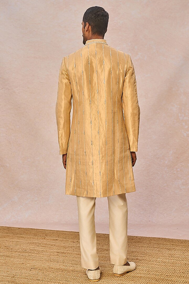Gold Silk Tissue Hand Embroidered Groom Sherwani Set by Masaba Men at Pernia's Pop Up Shop
