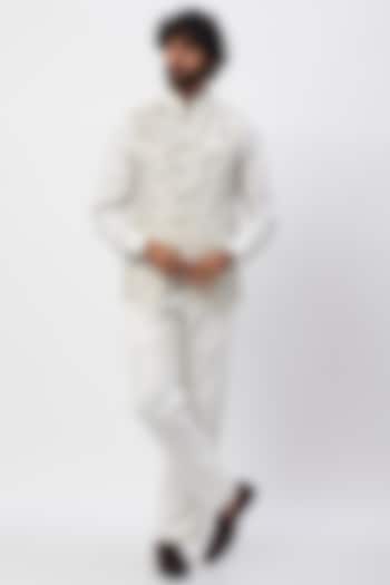 White Handcrafted Pant Set With Bundi Jacket by MR. SHAH LABEL