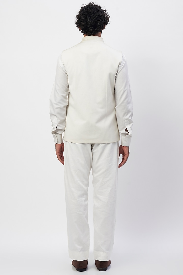 White Handcrafted Pant Set With Bundi Jacket by MR. SHAH LABEL