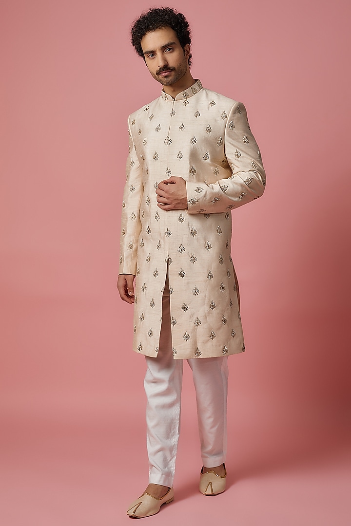 Off-White Raw Silk Pearl & Thread Embroidered Sherwani Set by MR. SHAH LABEL