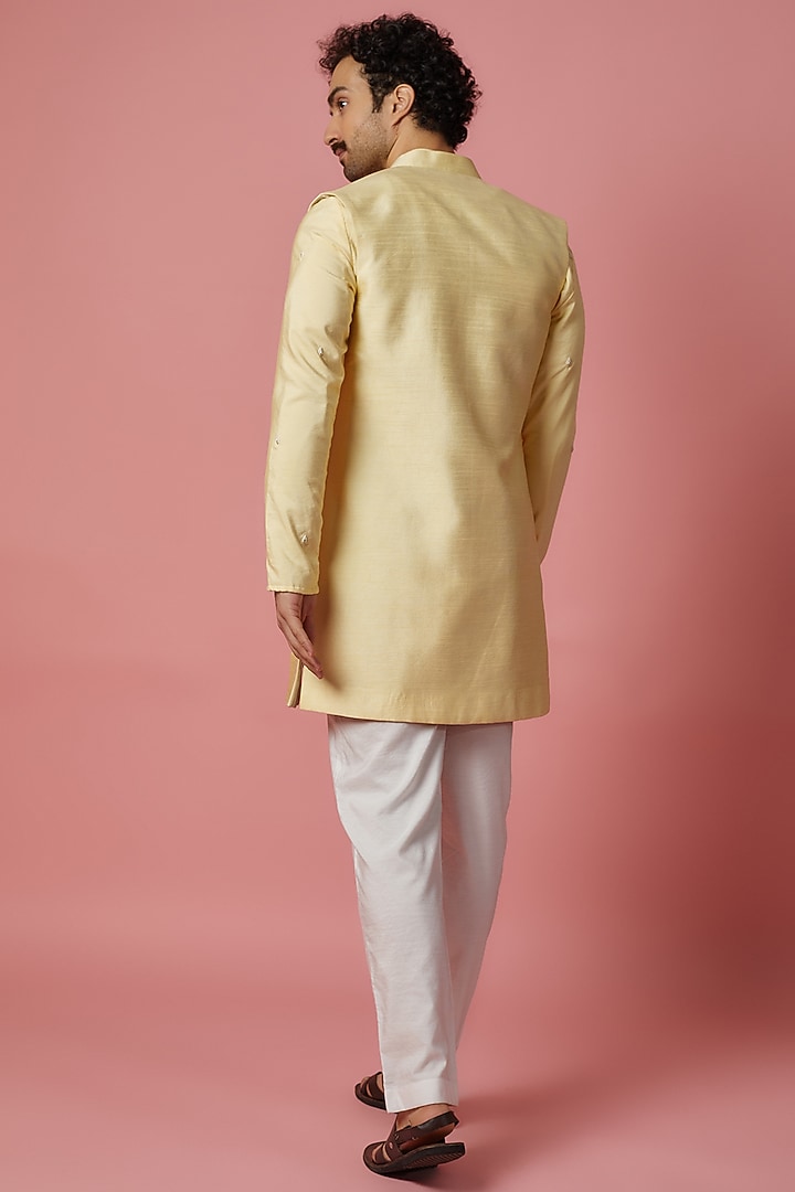 Lemon Yellow Cotton Silk & Raw Silk Hand Embroidered Bundi Jacket Set by MR. SHAH LABEL at Pernia's Pop Up Shop