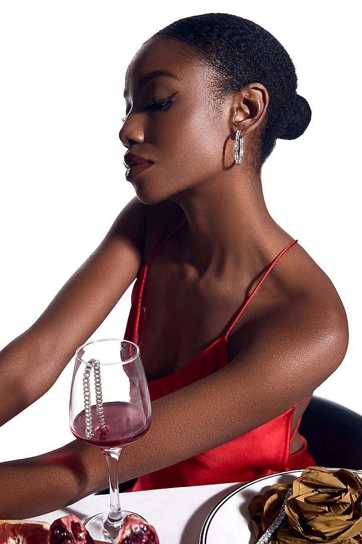 White Rhodium Finish Cubic Zirconia Cascading Brilliance Hoop Earrings In Sterling Silver by MISS JO at Pernia's Pop Up Shop