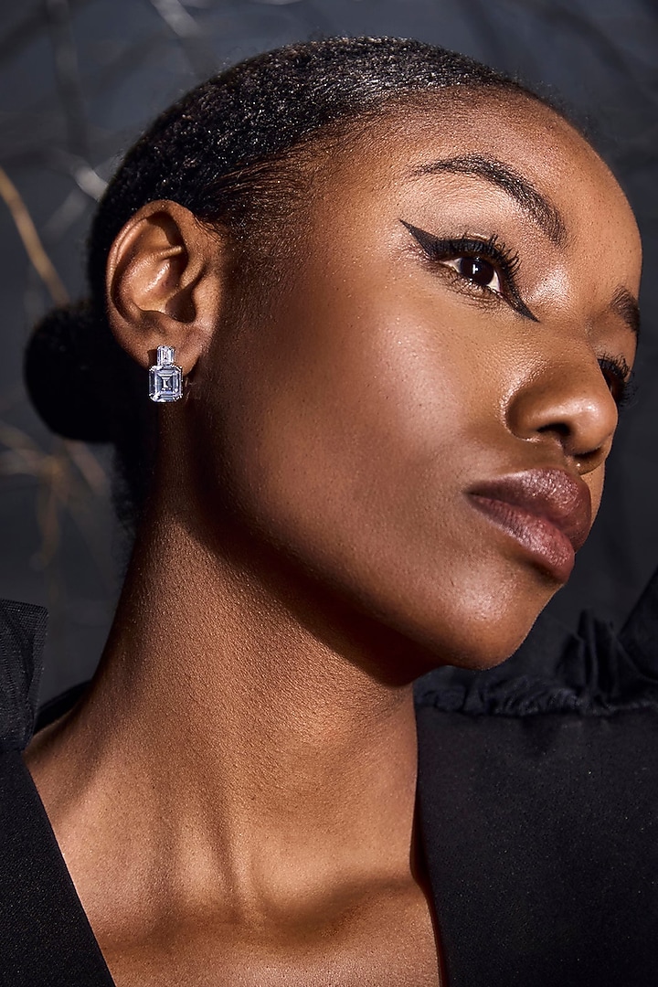 White Rhodium Finish Cubic Zirconia Emerald Cut Stud Earrings In Sterling Silver by MISS JO at Pernia's Pop Up Shop