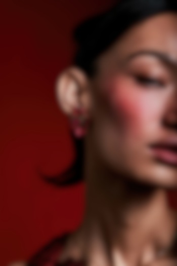 Gold Finish Cubic Zirconia & Red Stone Floral Stud Earrings In Sterling Silver by MISS JO at Pernia's Pop Up Shop