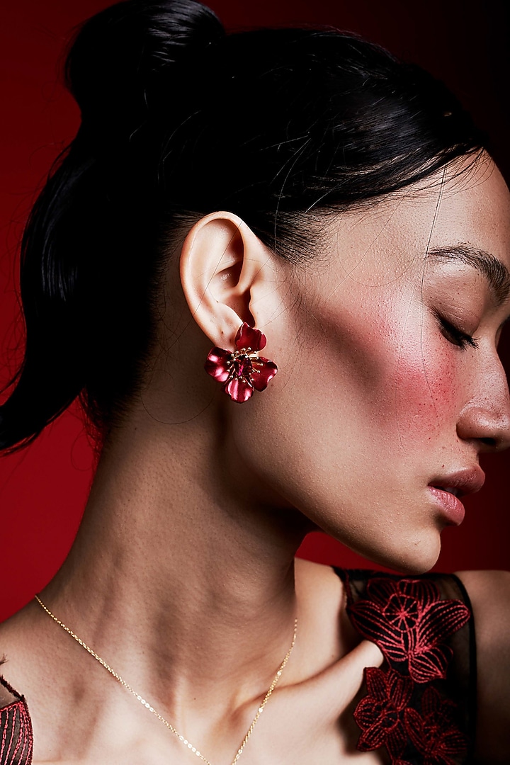 Gold Finish Cubic Zirconia & Red Stone Floral Stud Earrings In Sterling Silver by MISS JO at Pernia's Pop Up Shop