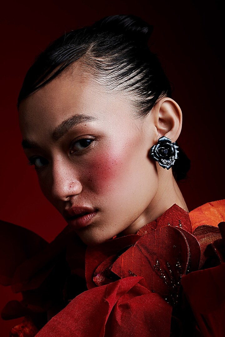 Gold Finish Cubic Zirconia & Black Stone Floral Stud Earrings In Sterling Silver by MISS JO at Pernia's Pop Up Shop