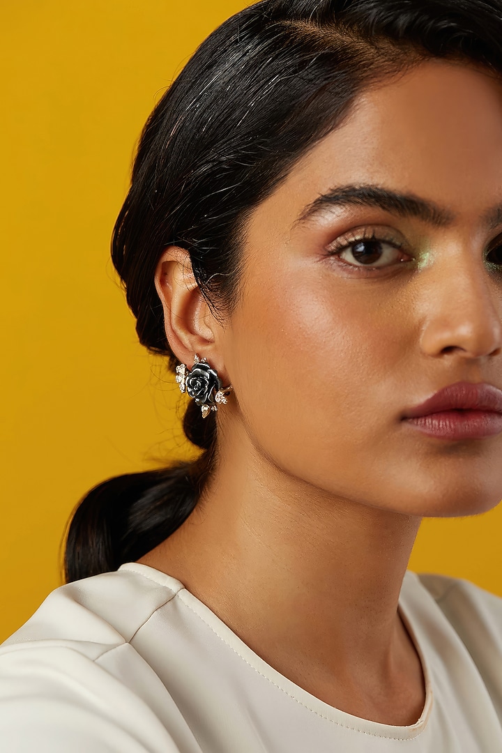 Gold Finish Cubic Zirconia & Black Stone Floral Stud Earrings In Sterling Silver by MISS JO at Pernia's Pop Up Shop