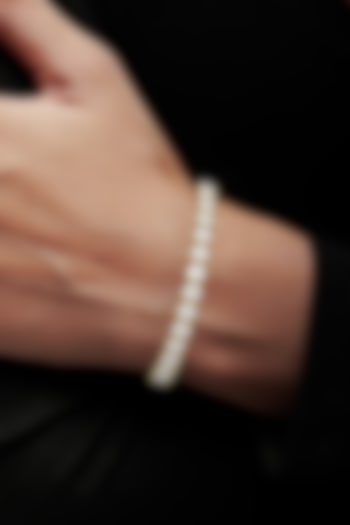 Gold Finish Cubic Zirconia Crystal Tennis Bracelet In Sterling Silver by MISS JO at Pernia's Pop Up Shop