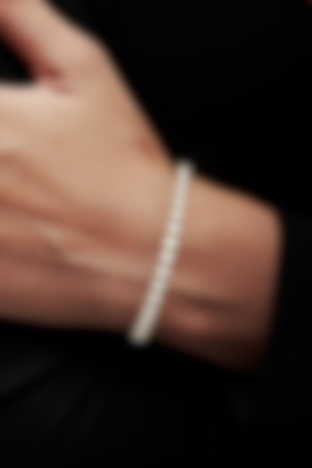 Gold Finish Cubic Zirconia Crystal Tennis Bracelet In Sterling Silver by MISS JO at Pernia's Pop Up Shop