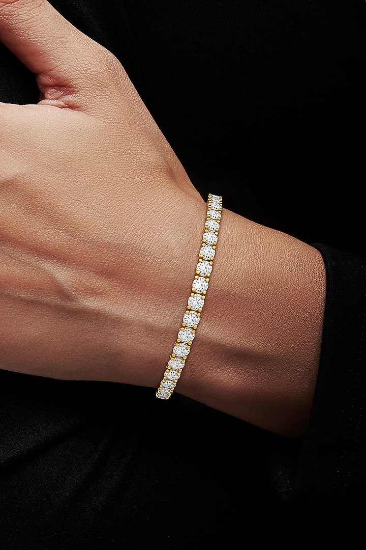 Gold Finish Cubic Zirconia Crystal Tennis Bracelet In Sterling Silver by MISS JO at Pernia's Pop Up Shop