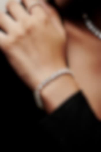 Gold Finish Cubic Zirconia Crystal Tennis Bracelet In Sterling Silver by MISS JO at Pernia's Pop Up Shop