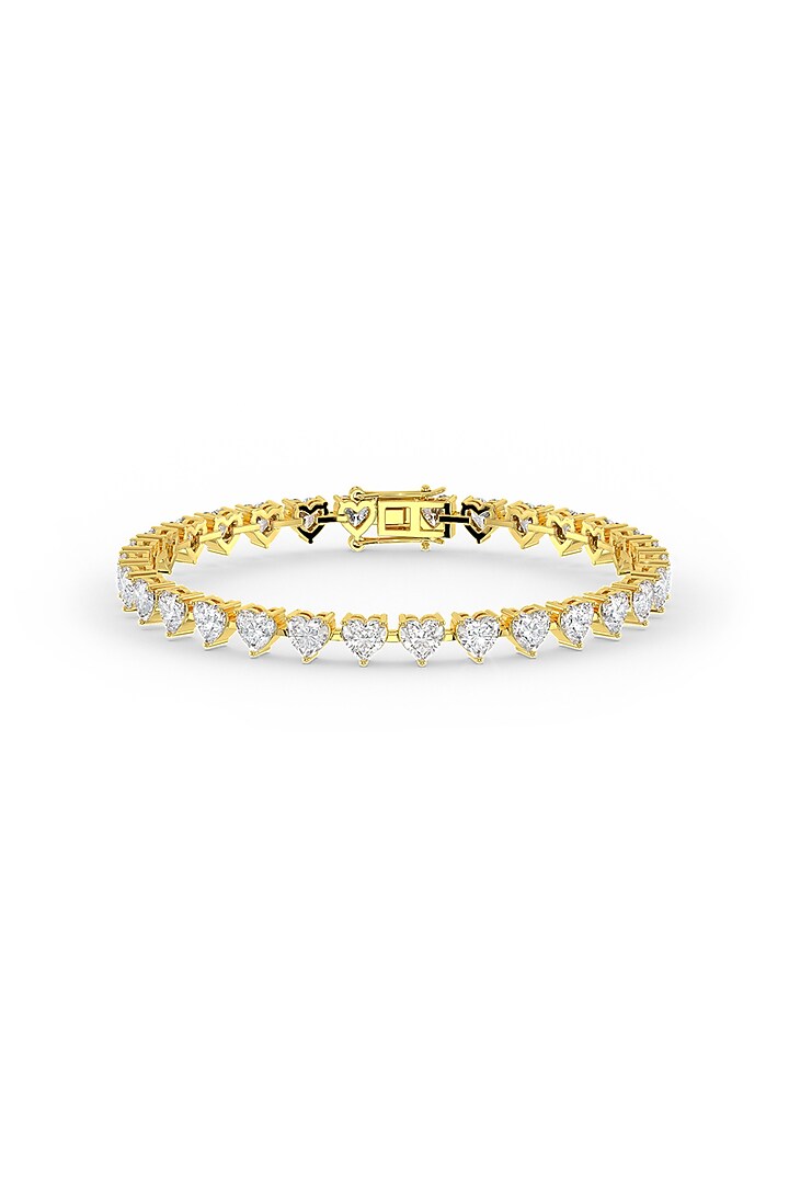 Gold Finish Heart-Shaped Cubic Zirconia Crystal Tennis Bracelet In Sterling Silver by MISS JO at Pernia's Pop Up Shop
