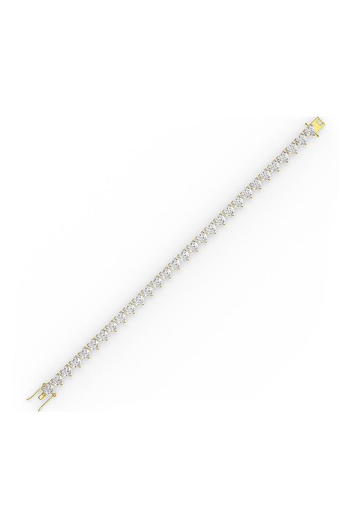 Gold Finish Heart-Shaped Cubic Zirconia Crystal Tennis Bracelet In Sterling Silver by MISS JO at Pernia's Pop Up Shop