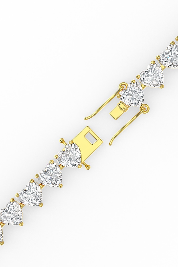 Gold Finish Heart-Shaped Cubic Zirconia Crystal Tennis Bracelet In Sterling Silver by MISS JO at Pernia's Pop Up Shop