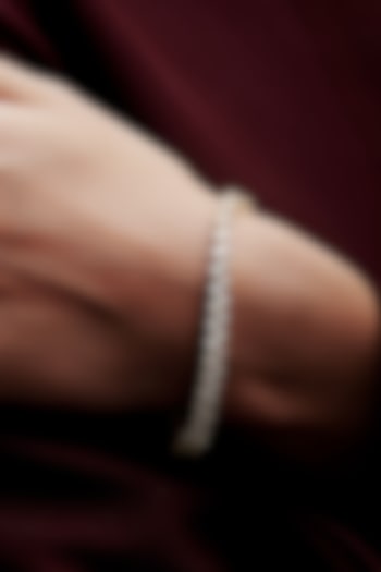 Gold Finish Pear-Shaped Cubic Zirconia Crystal Tennis Bracelet In Sterling Silver by MISS JO at Pernia's Pop Up Shop